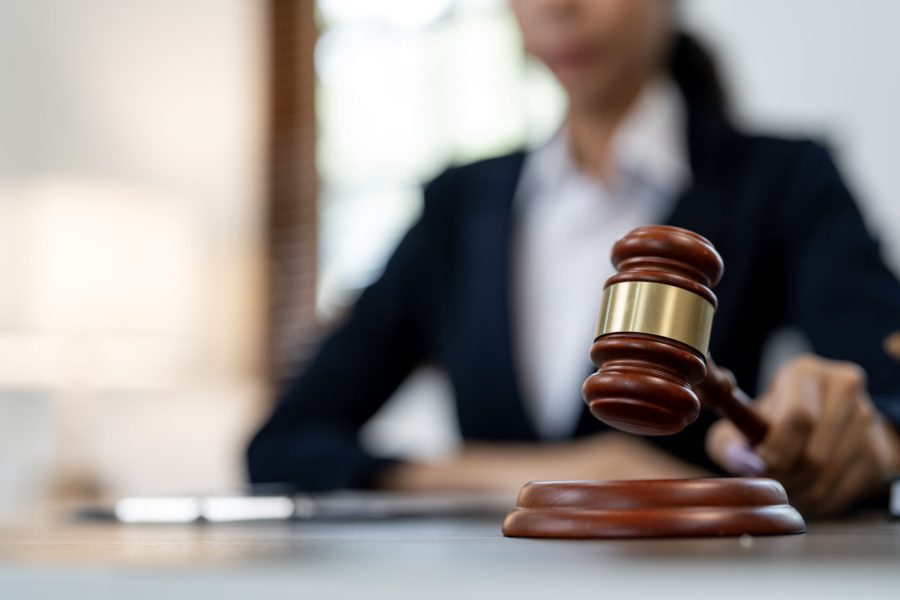 Court of Law and Justice Trial Session. Focus on Mallet, Hammer. Cinematic Shot of Dramatic Not Guilty Verdict. Close-up Shot.