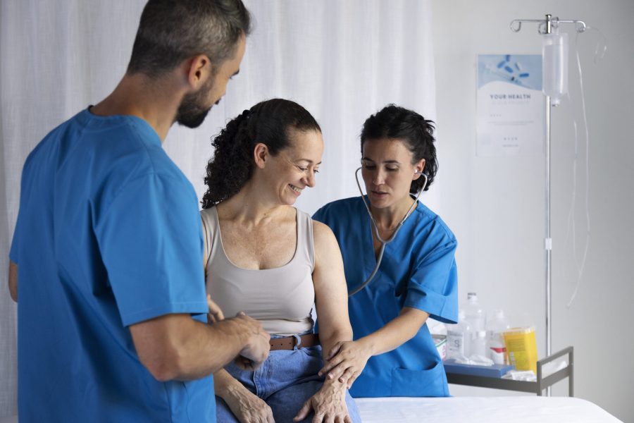 medium-shot-nurses-taking-care-patient